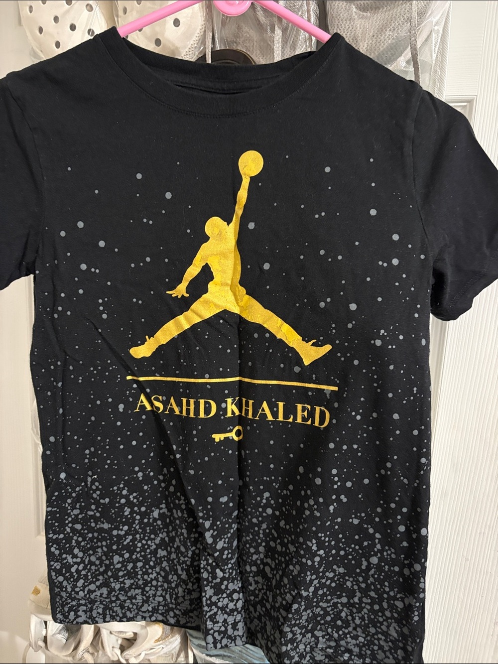 Jordan Black Tee with Gold Jumpman Logo - Asahd Khalel